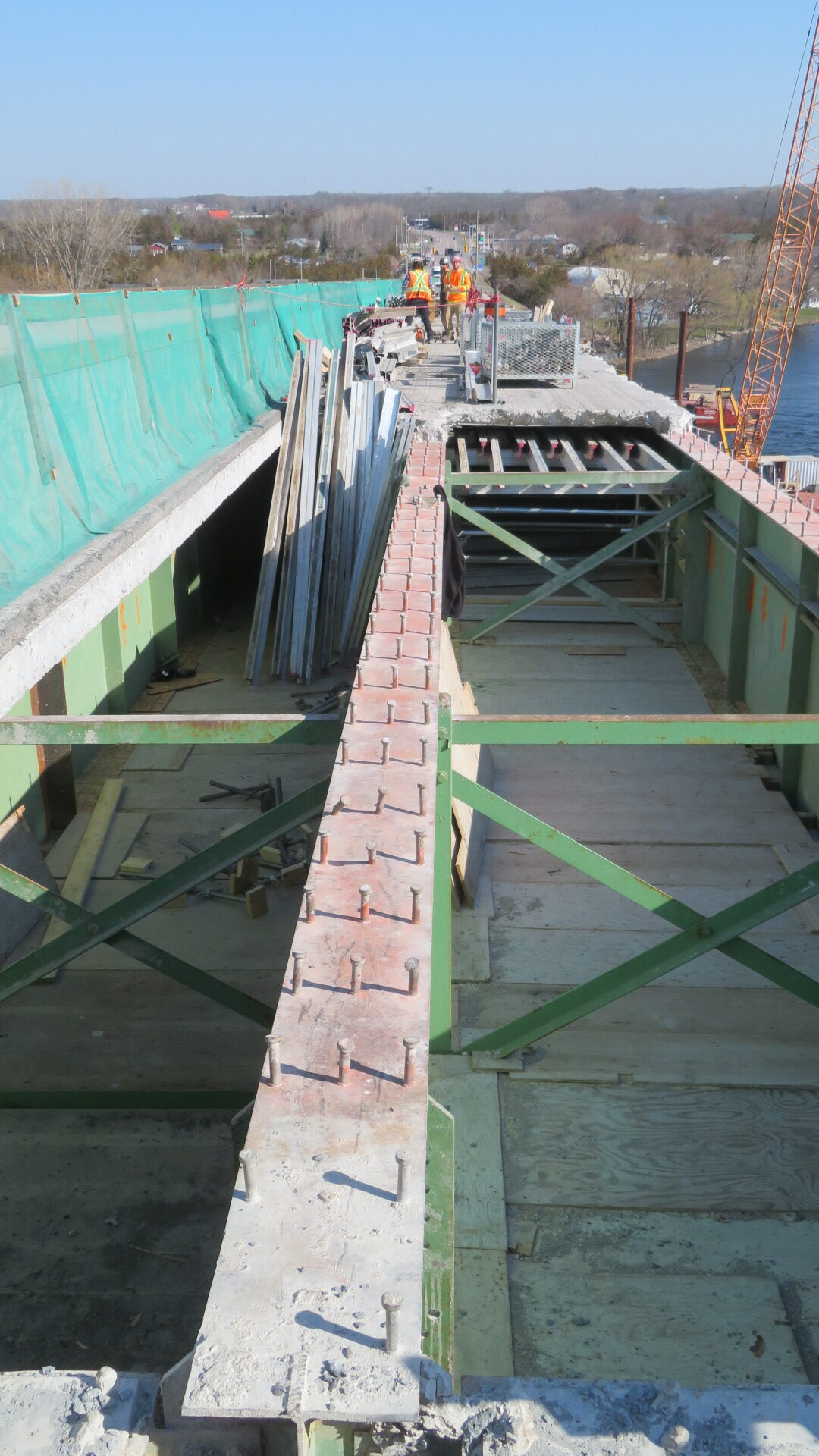 Exposed girders, false decking, containment scaffolding
