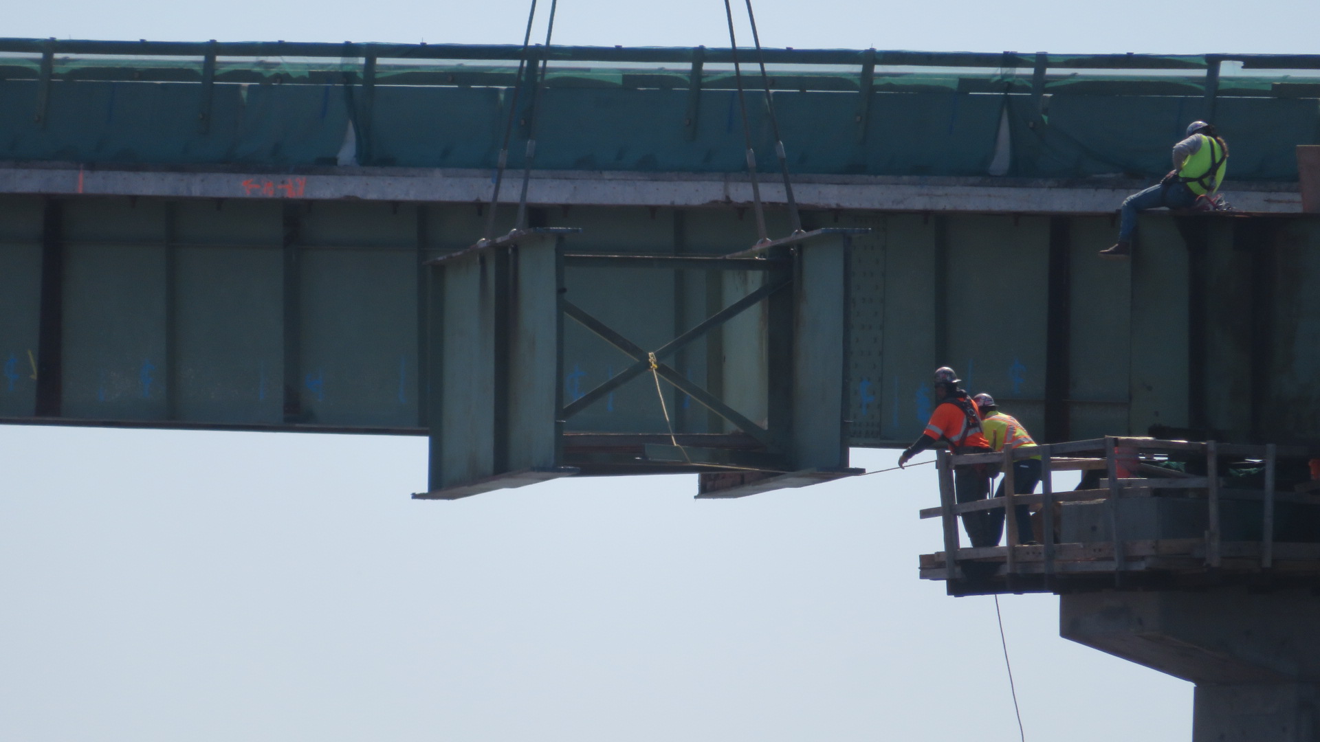 Lowering the girder section over the pier cap