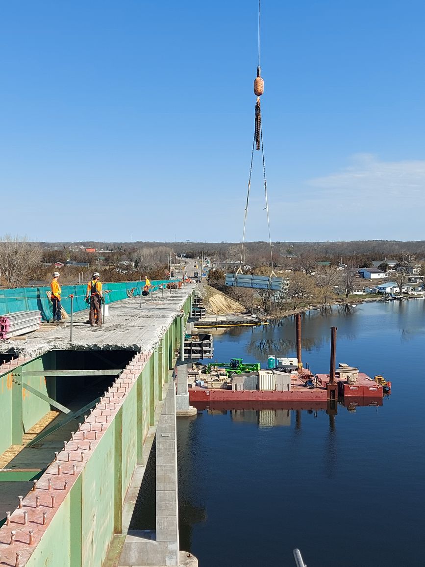 200-ton crane lifting the scaffolding to the bridge deck