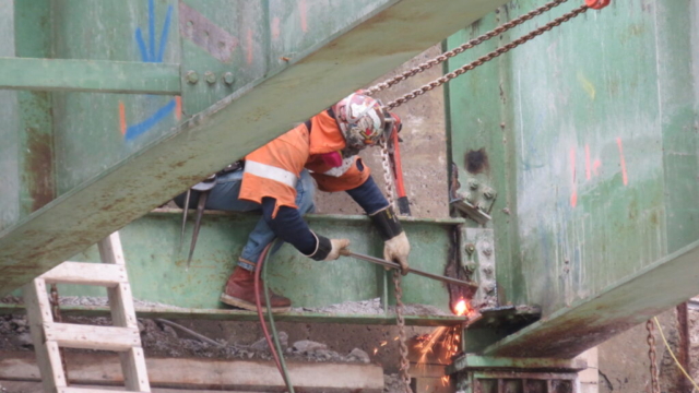 Torch cutting at the north abutment