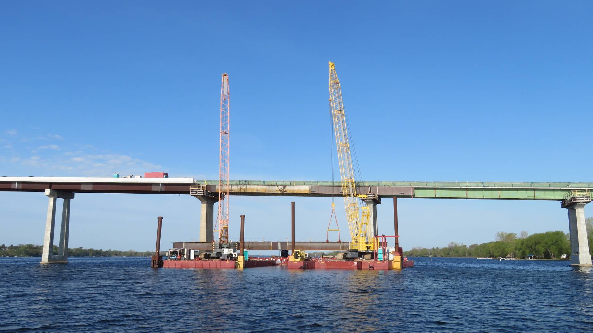 Both 200-ton cranes lifting the second girder