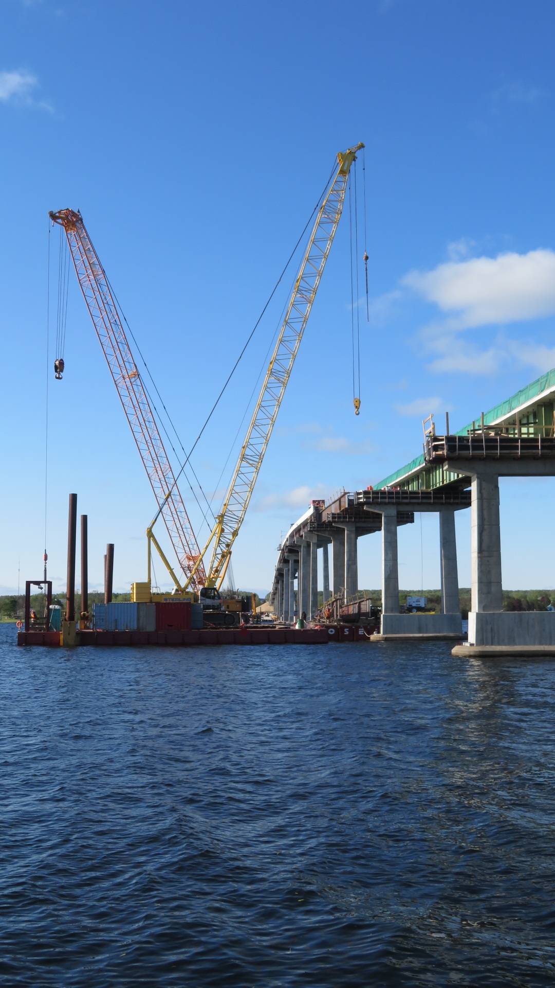 Both 200-ton cranes and barges preparing for girder lift