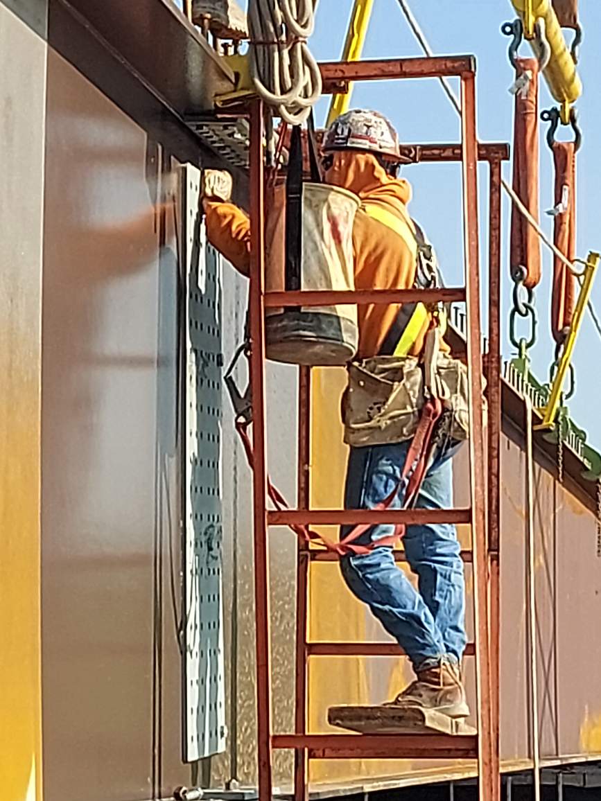 Bolting the newly placed girder