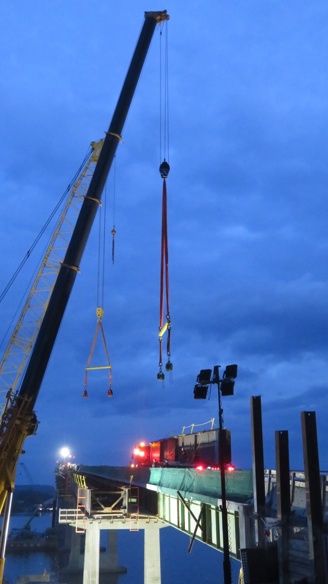Cranes, rigging, girder on the truck for installation