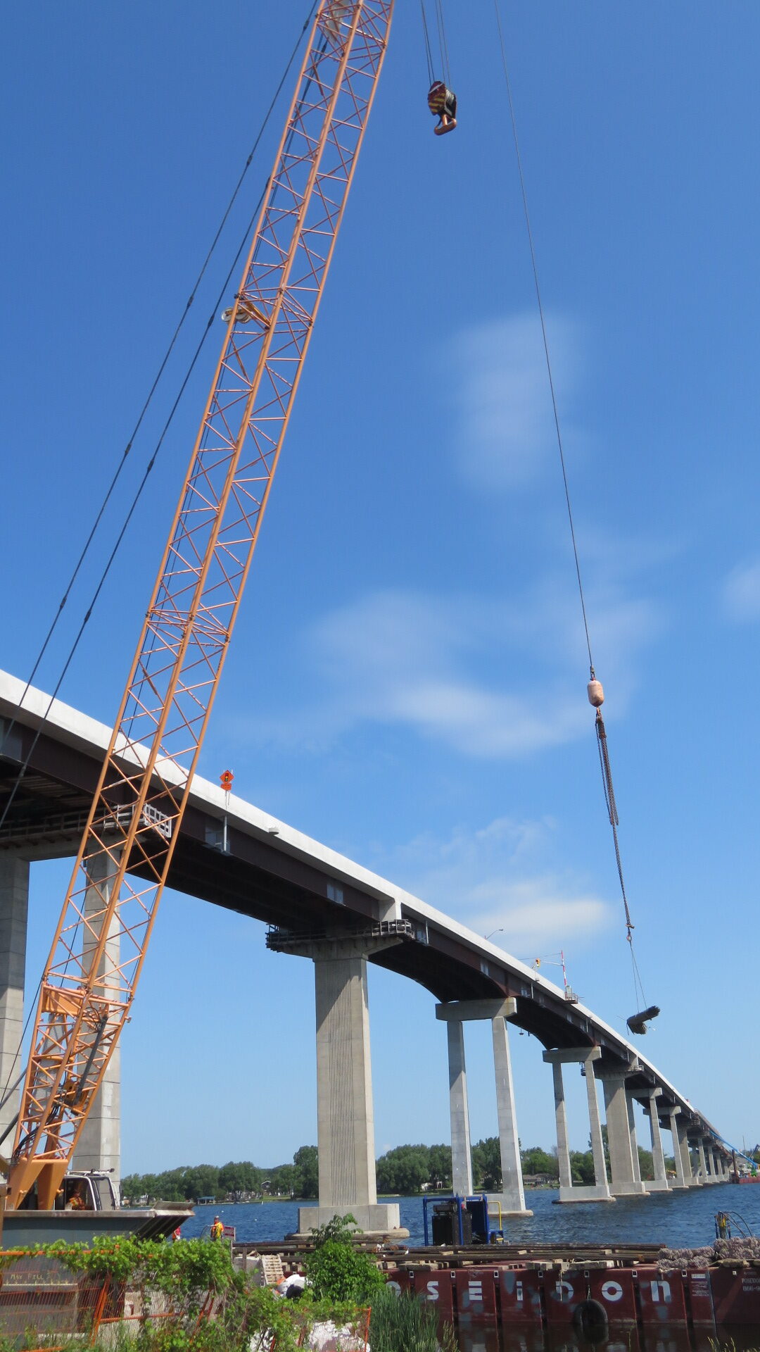 200-ton crane lifting rebar to the barge