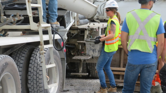 Placing concrete in the bucket for testing