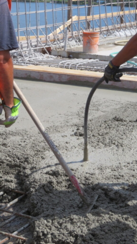 Vibrating the approach slab concrete