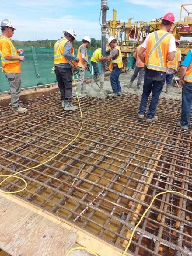 Pumping concrete into the deck formwork