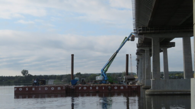 Barge and manlifts for work platform removal