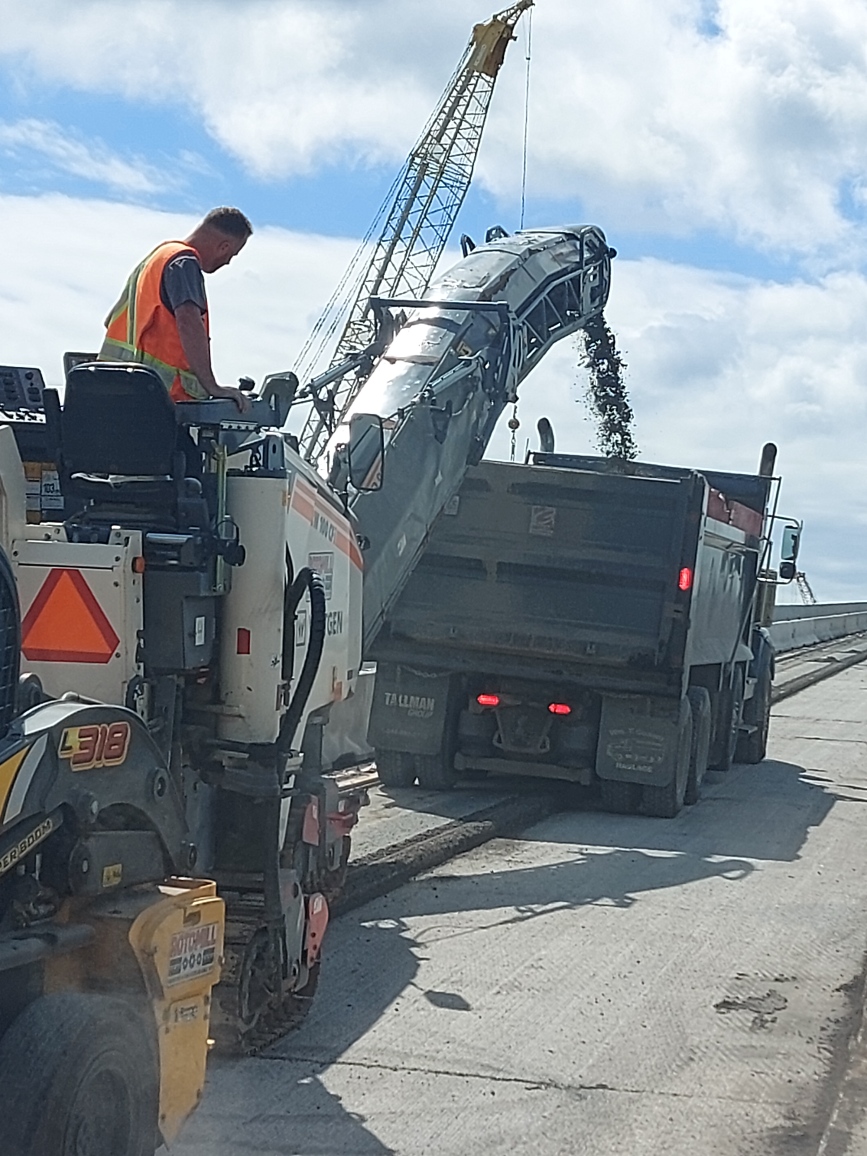 Removing asphalt into the truck